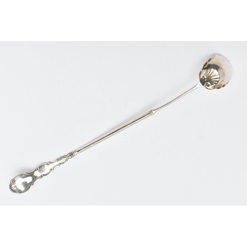 201 - AN AMERICAN STERLING SILVER LADLE, the handle cast with scroll and shell decoration and engraved mon... 