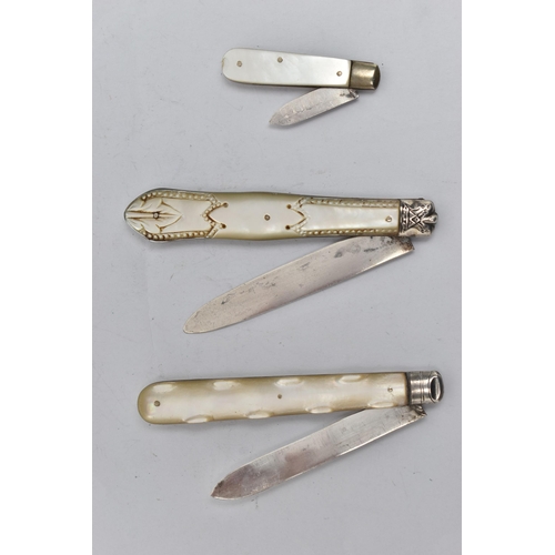 202 - THREE VICTORIAN / EDWARDIAN MOTHER OF PEARL AND SILVER FOLDING FRUIT KNIVES, the smallest with a pla... 