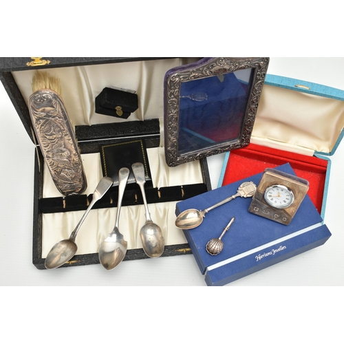 208 - A SMALL PARCEL OF SILVER ITEMS AND EMPTY BOXES, comprising a modern silver mounted bedside clock wit... 