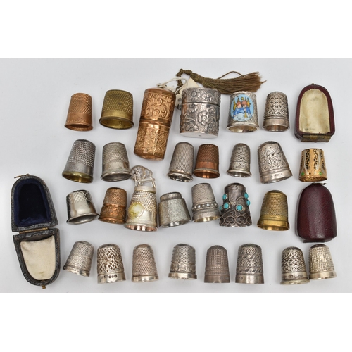 210 - EIGHT SILVER THIMBLES AND A QUANTITY OF ASSORTED METAL THIMBLES, ETC, the silver thimbles include on... 