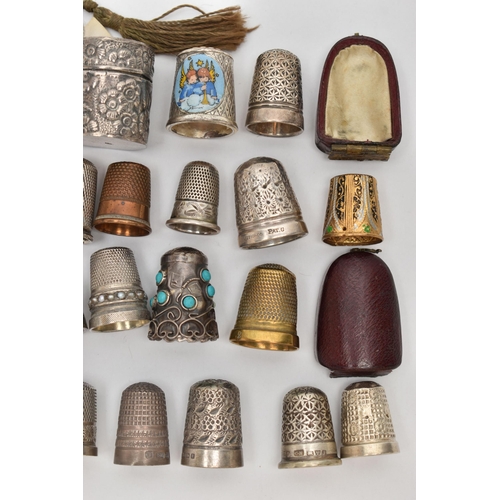 210 - EIGHT SILVER THIMBLES AND A QUANTITY OF ASSORTED METAL THIMBLES, ETC, the silver thimbles include on... 