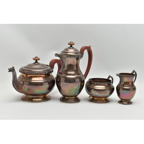 211 - AN ELIZABETH II SILVER FOUR PIECE TEA SET, cast with Celtic inspired border, pouring lips, handles a... 