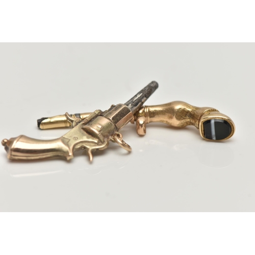 35 - TWO YELLOW METAL NOVELTY WATCH KEYS, the first in the form of a pistol, fitted with a jump ring unma... 