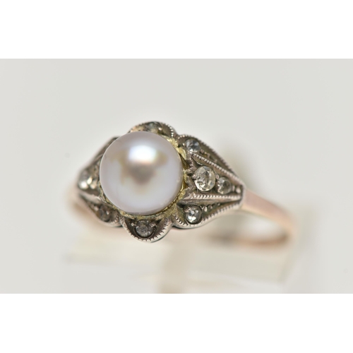 37 - A CULTURED BAROQUE PEARL RING, pearl measuring approximately 6.5mm, in a surround of colourless spin... 