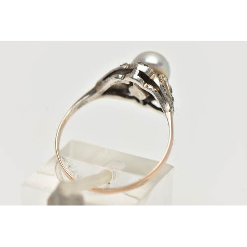 37 - A CULTURED BAROQUE PEARL RING, pearl measuring approximately 6.5mm, in a surround of colourless spin... 