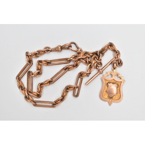 4 - A EARLY 20TH CENTURY 9CT GOLD ALBERT CHAIN AND FOB, a 9ct rose gold fetter style albert chain, fitte... 