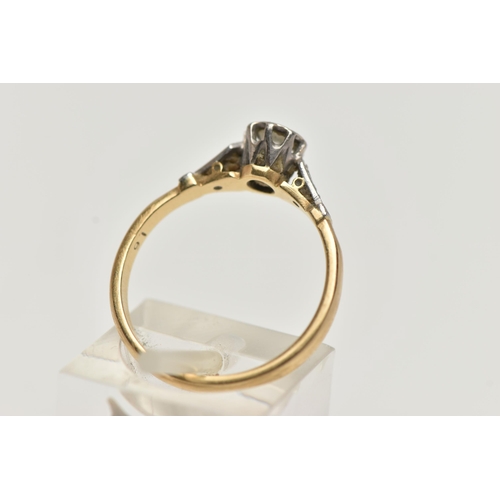 40 - A YELLOW AND WHITE METAL, SINGLE STONE DIAMOND RING, designed with an illusion set round brilliant c... 