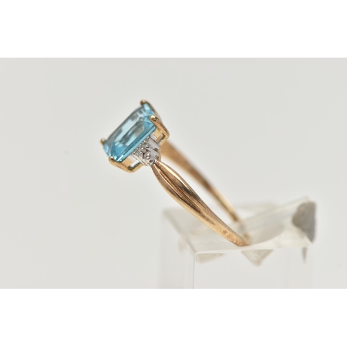 42 - A 9CT GOLD TOPAZ AND DIAMOND RING, designed with a rectangular cut light blue topaz, in a four claw ... 