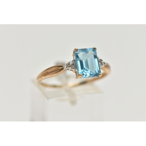 42 - A 9CT GOLD TOPAZ AND DIAMOND RING, designed with a rectangular cut light blue topaz, in a four claw ... 