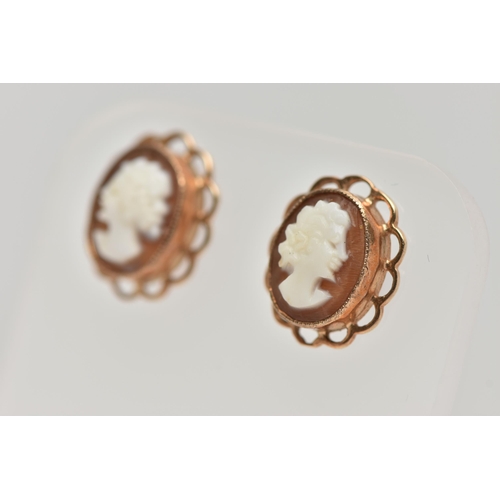 49 - A PAIR OF 9CT GOLD CAMEO STUD EARRINGS, each of an oval form with carved shell cameo depicting a lad... 