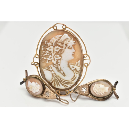 53 - A CAMEO BROOCH AND A PAIR OF EARRINGS, yellow metal oval brooch, with a carved shell cameo depicting... 