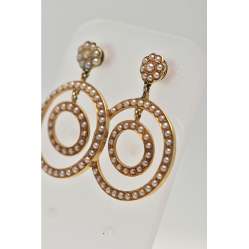 59 - A PAIR OF YELLOW METAL SEED PEARL DROP EARRINGS, each earring designed with two forward facing rings... 