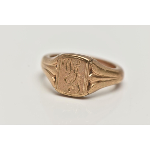 6 - A LARGE GENTS 9CT GOLD SIGNET RING, yellow gold signet, monogram engraved WJS, leading on to a dee... 