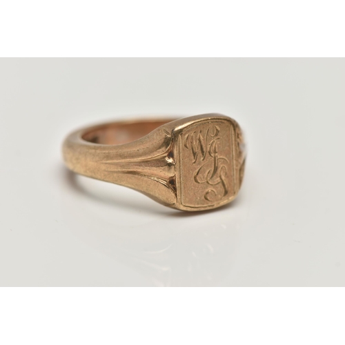 6 - A LARGE GENTS 9CT GOLD SIGNET RING, yellow gold signet, monogram engraved WJS, leading on to a dee... 