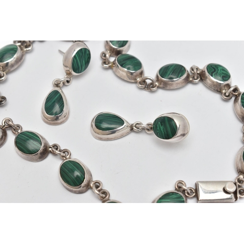 63 - A WHITE METAL MALACHITE NECKLACE AND PAIR OF EARRINGS, the necklace made up of a series of oval link... 