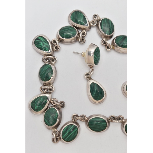 63 - A WHITE METAL MALACHITE NECKLACE AND PAIR OF EARRINGS, the necklace made up of a series of oval link... 