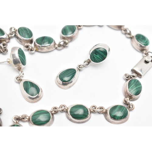 63 - A WHITE METAL MALACHITE NECKLACE AND PAIR OF EARRINGS, the necklace made up of a series of oval link... 