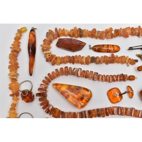 70 - ASSORTED AMBER JEWELLERY, to include a natural butterscotch amber pendant, suspended from a white me... 