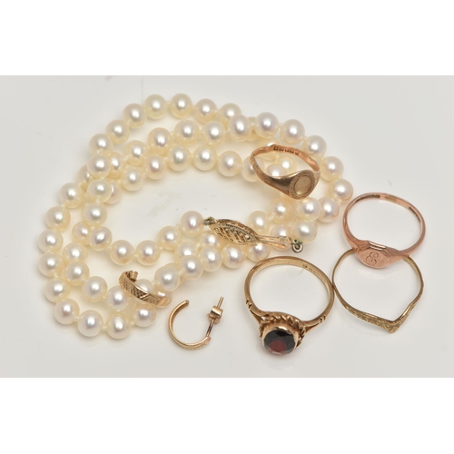 86 - AN ASSORTMENT OF 9CT AND YELLOW METAL JEWELLERY, to include an oval cut garnet in a collet setting r... 