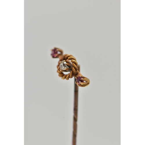 93 - AN EARLY 20TH CENTURY DIAMOND AND GEM STICKPIN, designed as a central old cut diamond within a rope ... 