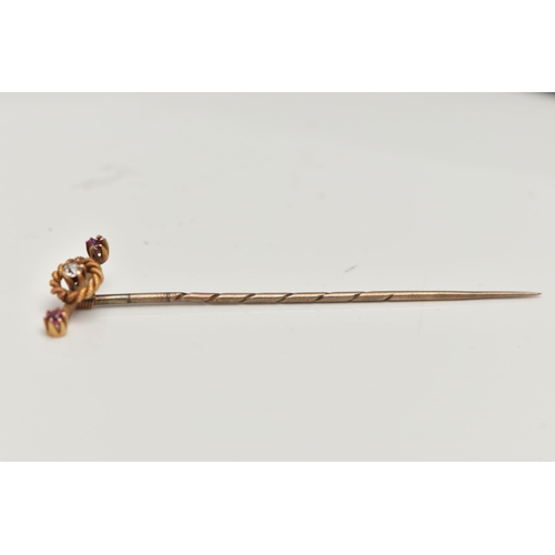 93 - AN EARLY 20TH CENTURY DIAMOND AND GEM STICKPIN, designed as a central old cut diamond within a rope ... 