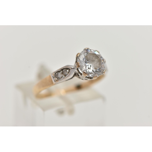 94 - A 9CT GOLD CUBIC ZIRCONIA RING, designed as a central circular colourless cubic zirconia to the cubi... 