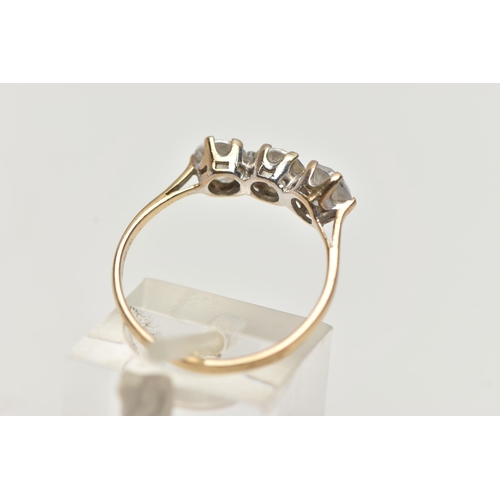 95 - A 9CT GOLD THREE STONE CUBIC ZIRCONIA RING, designed as three circular claw set colourless cubic zir... 