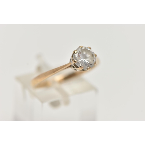 96 - A 9CT GOLD SINGLE STONE CUBIC ZIRCONIA RING, designed a circular cubic zirconia within an eight claw... 