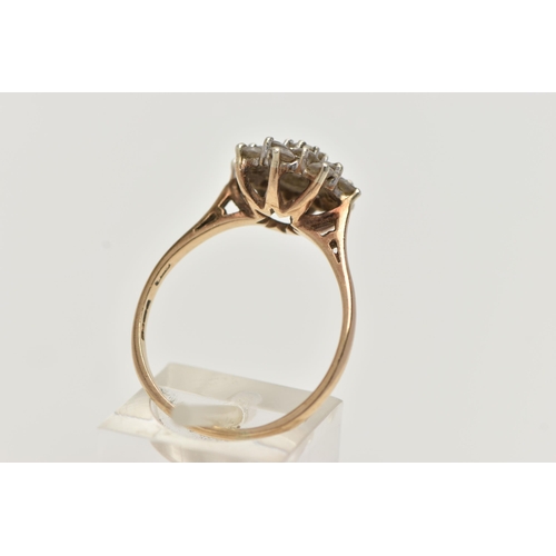 97 - A 9CT GOLD CLUSTER RING, sixteen circular cut cubic zirconia stones, prong set in yellow gold, hallm... 