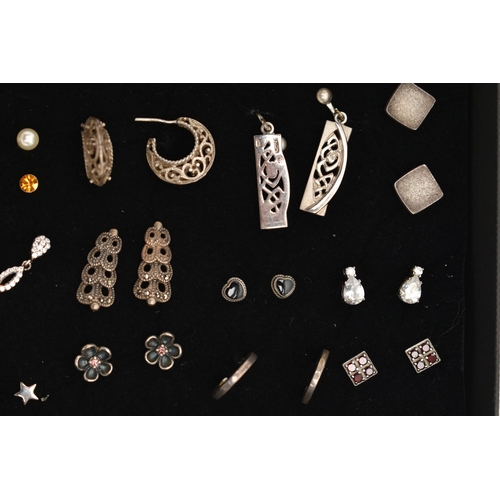 98 - AN ASSORTMENT OF WHITE METAL EARRINGS, twenty four pairs of earrings, to include stud and drop earri... 