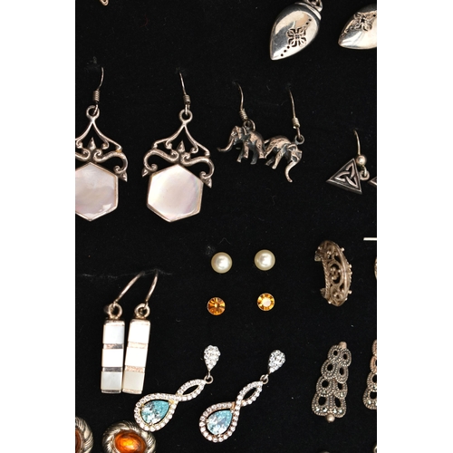 98 - AN ASSORTMENT OF WHITE METAL EARRINGS, twenty four pairs of earrings, to include stud and drop earri... 