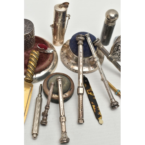 219 - A SMALL PARCEL OF SILVER AND PLATED PROPELLING PENCILS, BOOKMARKS, PIN CUSHIONS, ETC, a number of mo... 