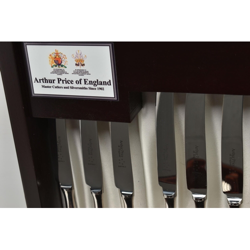 244 - AN 'ARTHUR PRICE OF ENGLAND' CANTEEN, mahogany wooden canteen, filled with a six person table settin... 