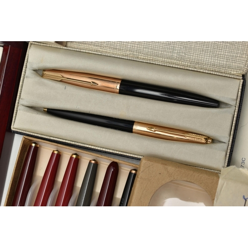 252 - AN ASSORTMENT OF PENS, to include a cased set of Parker pens, a set of six Parker fountain pens,... 