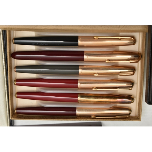 252 - AN ASSORTMENT OF PENS, to include a cased set of Parker pens, a set of six Parker fountain pens,... 