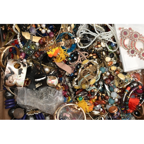 254 - A LARGE ASSORTMENT OF COSTUME JEWELLERY, to include bangles, bracelets, necklaces, brooches, earring... 