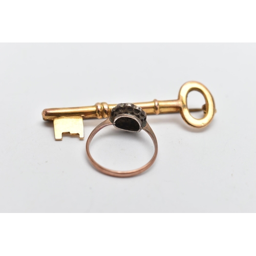 283 - A 9CT GOLD BROOCH AND A CLUSTER RING, the brooch in the form of a key, hallmarked 9ct Chester 1947, ... 