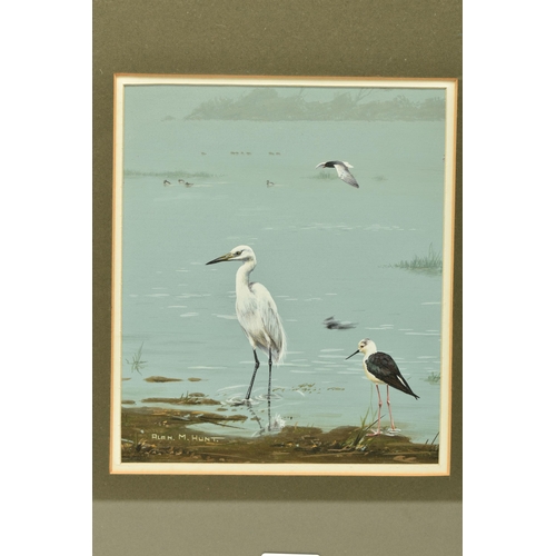 302 - ALAN M. HUNT (BRITISH 1947) WADING BIRDS, a Great White Heron and a Black Winged Stilt at the water'... 