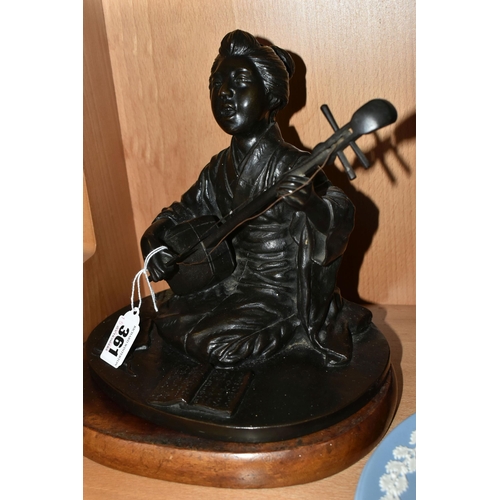 361 - A JAPANESE BRONZE OF A GEISHA KNEELING AND PLAYING A SHAMISEN, cast as singing and with book of musi... 