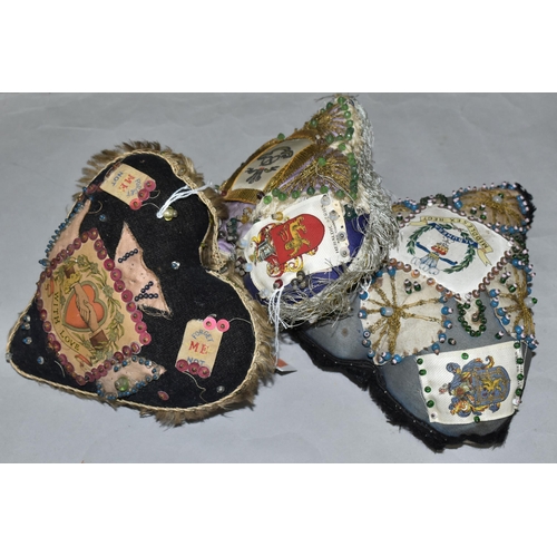 367 - THREE SWEETHEART PIN CUSHIONS, one bearing a 'Prince of Wales North Staffordshire Regiment' panel, w... 