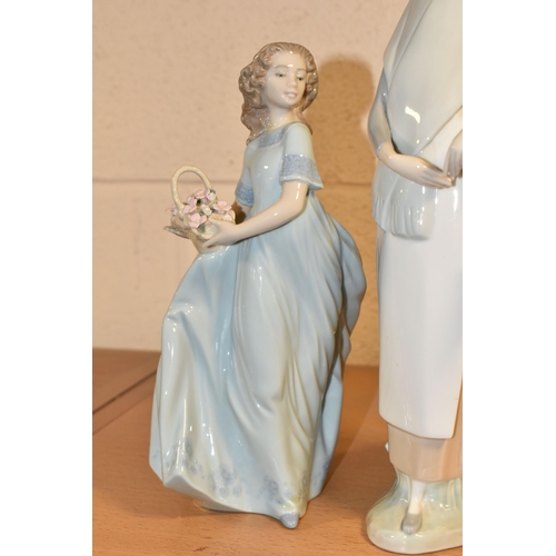 372 - TWO LLADRO FIGURES, comprising Market Day Girl, modelled carrying a basket and with a bundle on her ... 