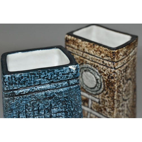 374 - TWO TROIKA POTTERY COFFIN VASES, in shades of blue, grey and brown, with impressed and incised decor... 