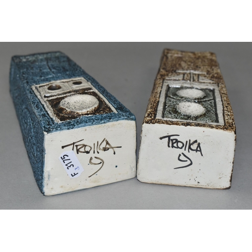 374 - TWO TROIKA POTTERY COFFIN VASES, in shades of blue, grey and brown, with impressed and incised decor... 