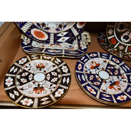 381 - NINE ROYAL CROWN DERBY AND SIMILAR IMARI PLATES, comprising a Royal Crown Derby 1128 side plate and ... 