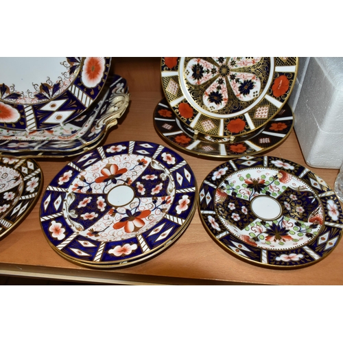 381 - NINE ROYAL CROWN DERBY AND SIMILAR IMARI PLATES, comprising a Royal Crown Derby 1128 side plate and ... 