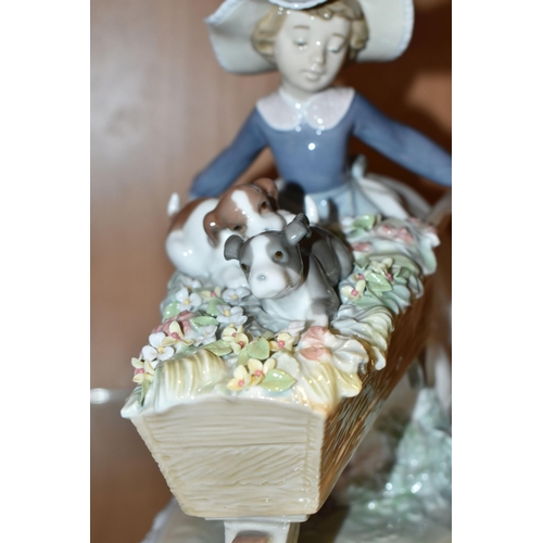 386 - A LLADRO 'A BARROW OF FUN' FIGURE, model no 5460, depicting a girl pushing a wheelbarrow of puppies ... 