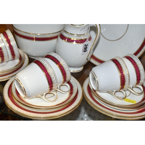 390 - A TWENTY ONE PIECE COPELAND TEA SET, having a red border and gilt decoration, comprising a cake plat... 