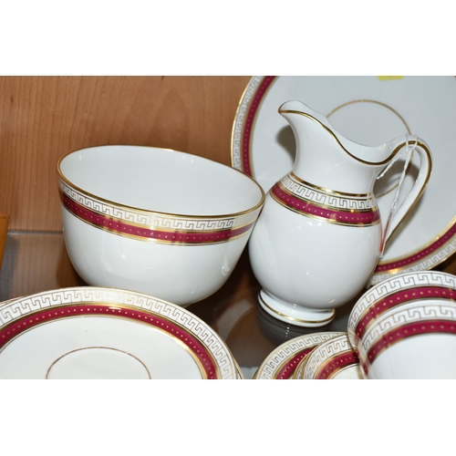 390 - A TWENTY ONE PIECE COPELAND TEA SET, having a red border and gilt decoration, comprising a cake plat... 