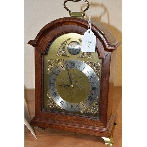 394 - TWO MANTEL CLOCKS, comprising a black slate mantel clock, green and black marble pillars, height 30c... 