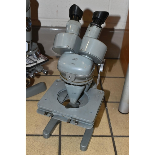 408 - TWO MID - CENTURY STEREOSCOPIC MICROSCOPES, comprising a Watson Barnet 143368 with wooden case and k... 